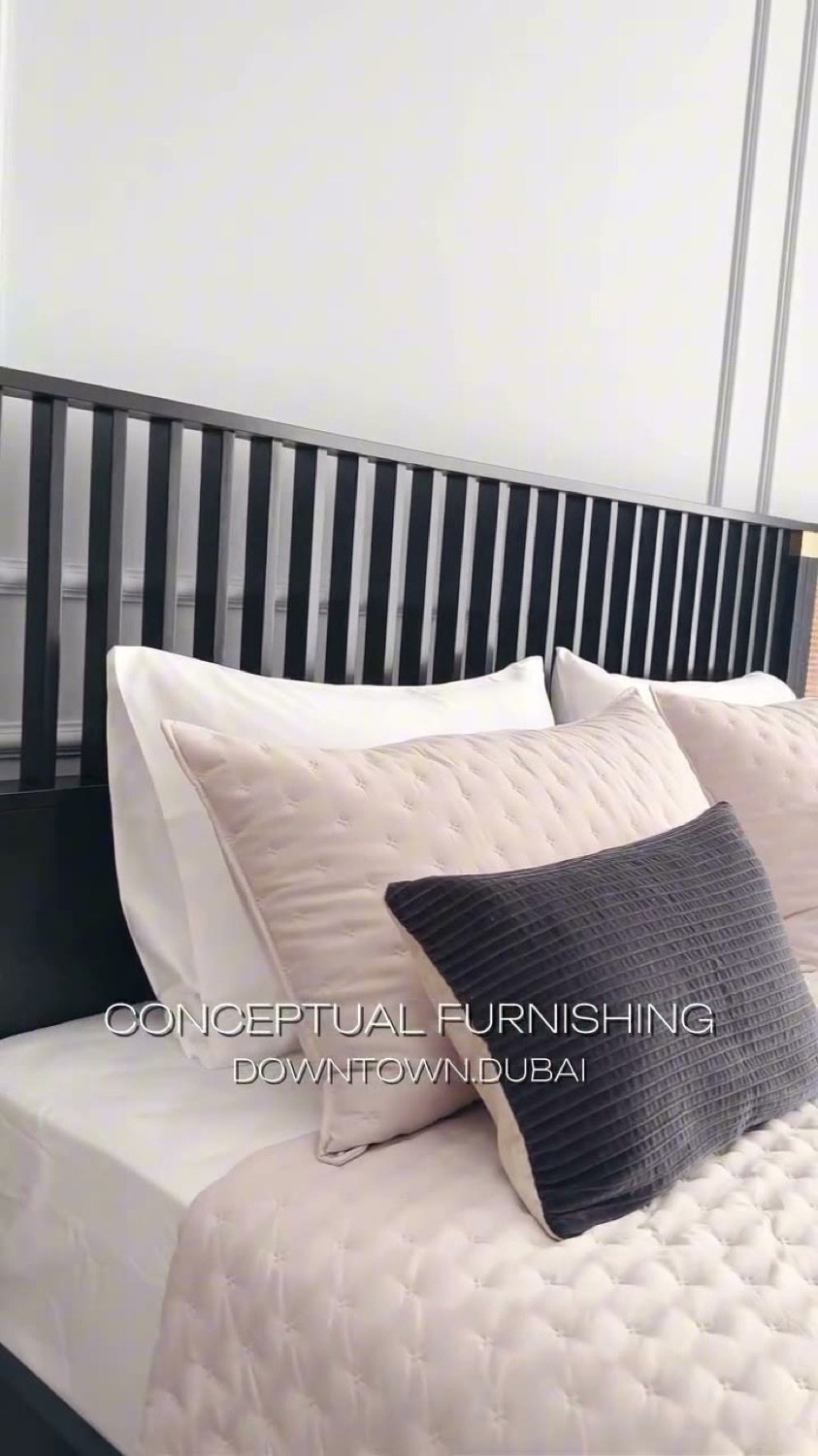 Downtown Dubai bedroom furnishing with layered pillows